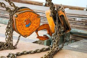 Rusty industrial chain hoist photo