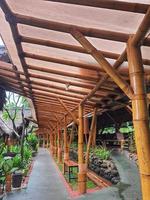 A typical Sundanese saung made of bamboo in a garden belonging to a Sundanese restaurant. photo