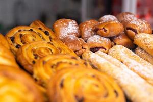 delicious buns and pastries with filling photo