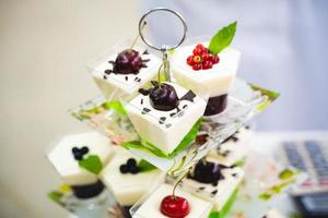 delicious sweet dessert, cake, candy bar on celebration photo