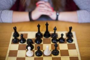 chess player thinking while playing game photo