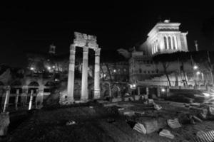 Rome, Italy, ruins of the old city at night with backlight. photo