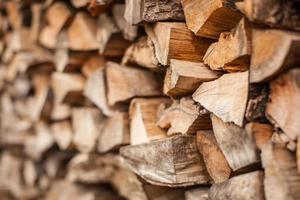 beautifully stacked firewood, natural wood for burning in the furnace photo