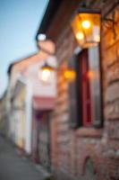 street of the old city lanterns shine, blurred background, wallpaper photo