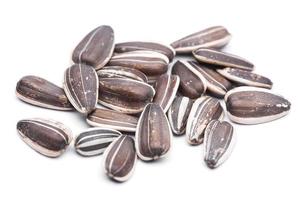 photo close-up of sunflower seeds on a white background