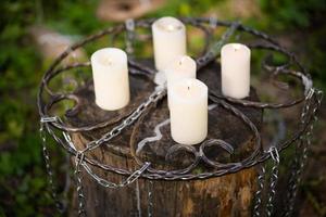 many candles on a stump photo