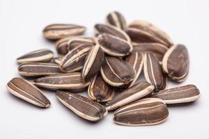 photo close-up of sunflower seeds on a white background