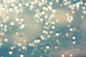 abstract blurred bokeh light with warm tone color background concept. photo