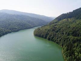 beautiful landscape from a drone on the mountains and the river photo