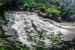 The beauty of a very natural waterfall scenery named Goa Rang Reng waterfall located in Gianyar Bali. photo