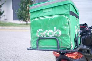 Singapore 1 june 2022. Grab Food logo on delivery bag photo