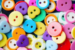 color Plastic buttons on white background photo