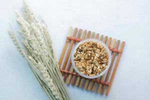 top view of granola Musli in a jar on table photo