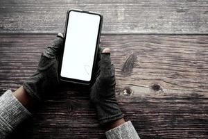 hacker hand stealing data from smart phone photo