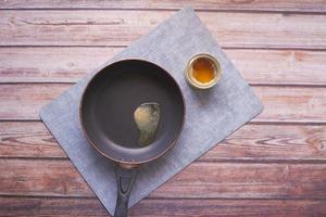 homemade ghee in cooking pan container on a table , photo