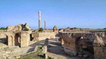 View of the historical landmark The Baths of Antoninus in Carthage , Tunisia. Unesco World Heritage Site. Archaeological Site of Carthage. Place of historic interest. Ancient ruins. video