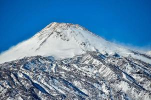 Scenic snowy mountains view photo