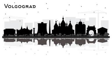 silueta del horizonte de la ciudad de volgogrado rusia con edificios negros y reflejos aislados en blanco. vector