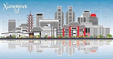 Xiaogan China City Skyline with Color Buildings, Blue Sky and Reflections. vector