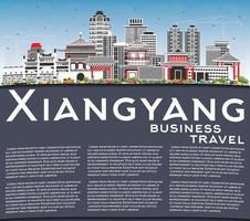 horizonte de la ciudad china de xiangyang con edificios de color, cielo azul y espacio de copia. vector