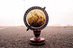 Globe on the road photo