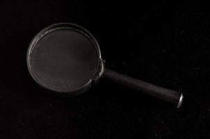 Isolated magnifying glass photo