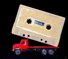 Toy truck carrying a tape photo