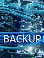 Backup button on modern server room background. Data loss prevention. System recovery. photo