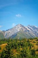 High Tatra mountain autumn sunny day, relaxing landscape, alp view. Natural view during summer trekking in highlands with peaks and rocky hills view. National Park in Poland. photo