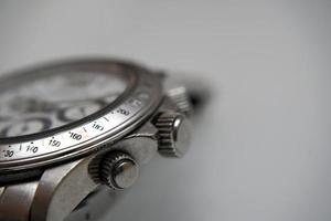 Silver wrist watch on white background photo