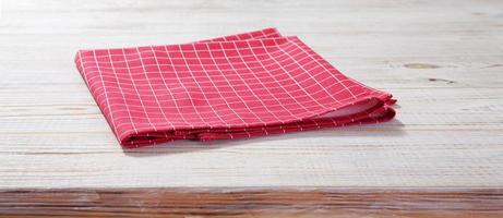 Wooden table with napkin. photo