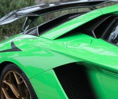 green sleek italian sports car photo