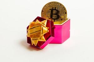 Coin bitcoin in a gift box for a ring or jewelry the concept of crypto currency the best gift photo