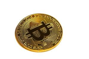 Golden bitcoin isolated on white background photo