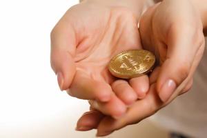 The money coin on hands or coins exchange in stock market