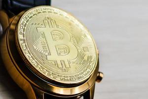 Bitcoin and time concept bitcoin in the form of a clock face photo