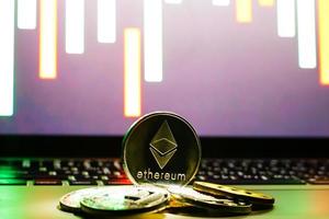 ethereum on gold background to illustrate blockchain and cyber currency photo