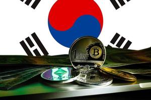 bitcoin litecoin gold us dollar and south korea flag conceptual image photo