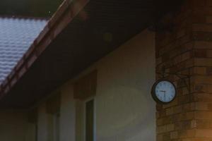 old hours, 9.30 hours Clock on wood table in the green garden time at o clock photo