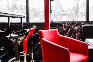 Luxurious interior of the restaurant red armchair photo