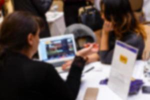 Blurred background officer working on computer at office building business background with photo