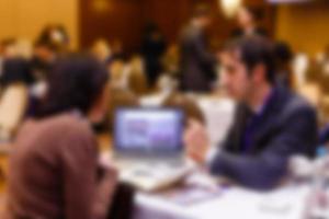 Blurred background officer working on computer at office building business background with photo