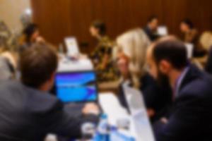 Blurred background officer working on computer at office building business background with photo