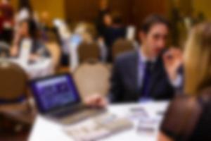 Blurred background officer working on computer at office building business background with photo