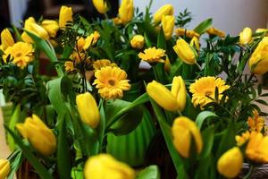 bouquet of yellow tulips and chrysanthemums photo