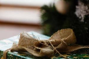 Still life of burlap wrapped present photo
