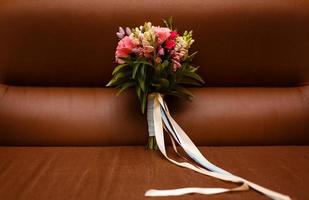 Flower arrangement on a dark background photo