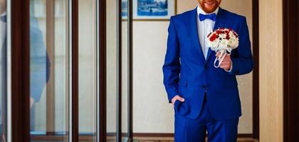 Handsome groom in suit  the nature male portrait  the park beautiful model boy  colorful photo