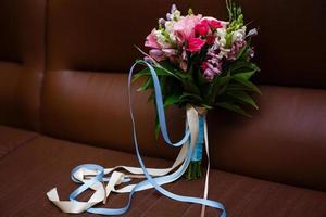 Flower arrangement on a dark background photo