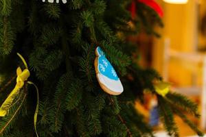 Christmas tree decorated with gingerbread cookies photo